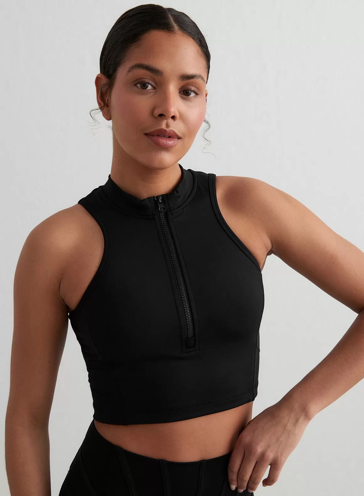 AIM’N Black Sculpting Racer Front Zip Top